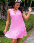 THML Pink Textured Sleeveless Dress with ruffled hem and collared neckline, perfect for summer elegance and outdoor occasions.