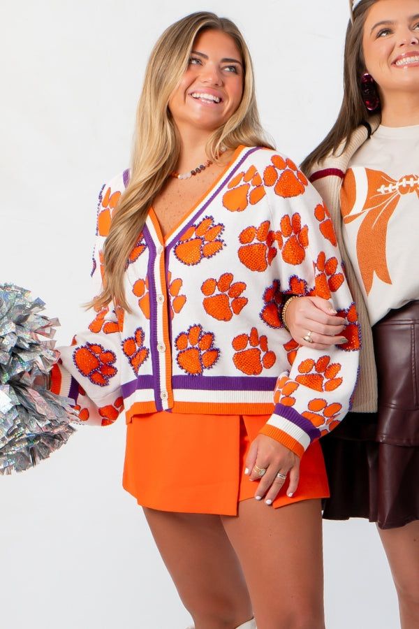 Queen of Sparkles Clemson Mascot Rhinestone Cardigan with orange tiger paw rhinestones, styled for game day with cheer accessories.