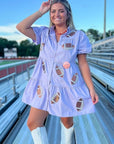 Front view of Lavender Sequin Football Dress - Trendsetting Gameday Style with playful football sequin details and short sleeves, ideal for tailgating fashion.