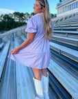 Back view of Lavender Sequin Football Dress - Trendsetting Gameday Style showing tiered design and puff sleeves, perfect for sporty-chic outfits.