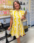 Better In Yellow Ruffle Mini Dress with tiered skirt and flutter sleeves, styled for a cheerful classroom-ready look.