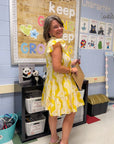 Back view of Better In Yellow Tiered Ruffle Sleeve Mini Dress showing flowy layers and playful silhouette, ideal for school or casual outings.
