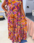 Close-up of Purple Leaf Maxi Dress - Multicolor Print showing vibrant leafy pattern and tiered skirt, ideal for casual or vacation wear.