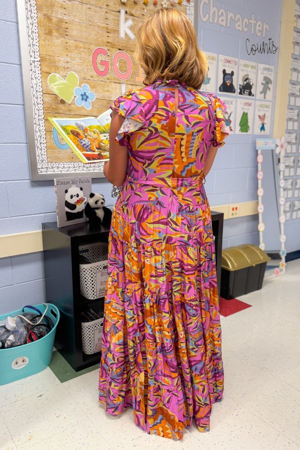 Back view of Purple Leaf Maxi Dress - Multicolor Print highlighting the detailed leafy design and flattering silhouette.