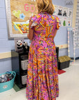 Back view of Purple Leaf Maxi Dress - Multicolor Print highlighting the detailed leafy design and flattering silhouette.