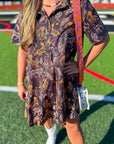 Close-up of Tiger Printed Button Down Mini Dress featuring bold tiger print, short sleeves, and collar—ideal for spirited gameday fashion.