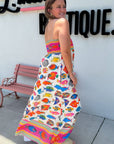 Side view of Show Me Your Mumu Rainbow Reef Skylar Maxi Dress highlighting its breezy silhouette and bold summer colors.