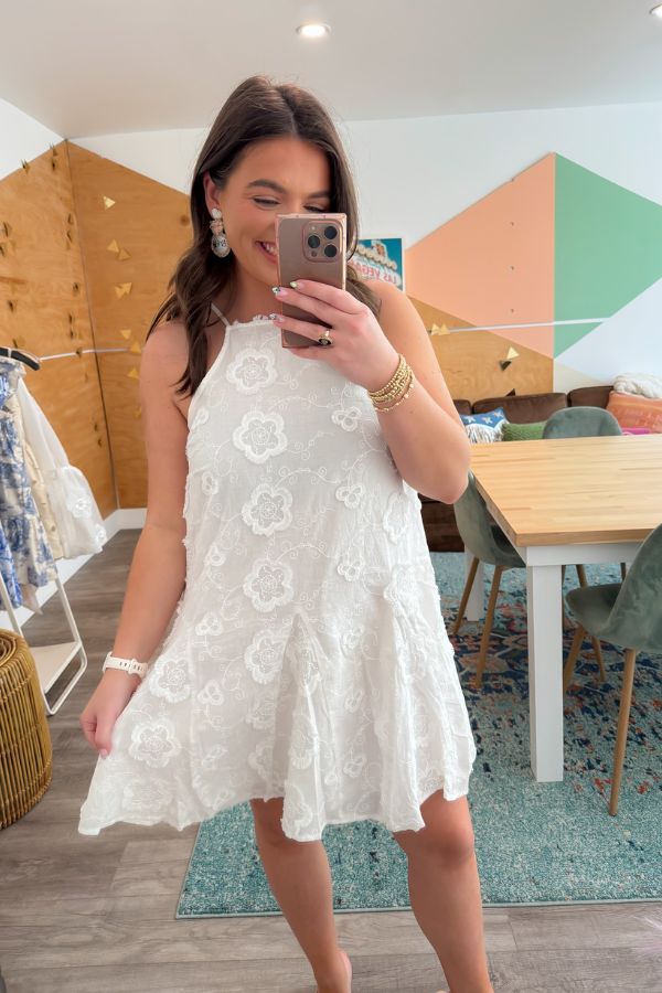 Antique Floral Halter Dress with white lace embroidery, perfect for bridal showers or summer events. Features a flared silhouette and halter neckline.