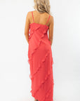 Back view of the MINKPINK Red Ruffle Maxi Dress showcasing delicate spaghetti straps and cascading ruffles for a sophisticated evening outfit.