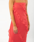 Close-up of the MINKPINK Red Ruffle Maxi Dress highlighting its soft fabric, diagonal ruffle accents, and elegant square neckline for a chic look.