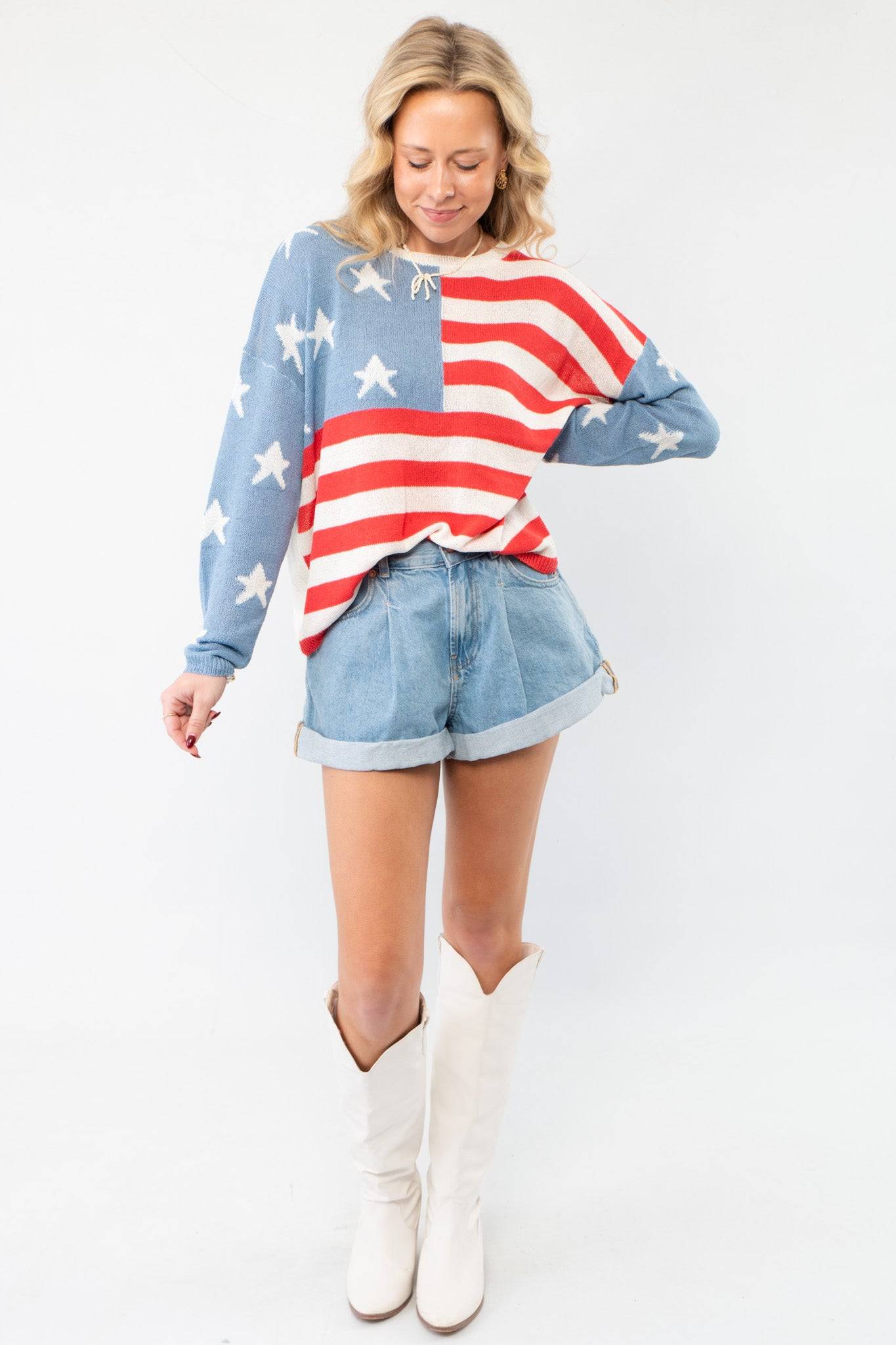 All America Red, White & Blue Flag Sweater - Patriotic Knit for Summer styled with denim shorts and white boots, perfect for July 4th celebrations.