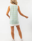 Back view of the Show Me Your Mumu Green Plaid Knit Hartford Tank Sweater Dress, showcasing its sleeveless design and ribbed hem.