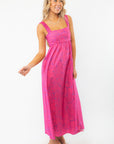 Side view of the Show Me Your Mumu Pink Shells Fling Midi Dress highlighting its flattering empire waist and lightweight fabric for effortless style.
