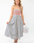 THML Smocked Blue Striped Tie Strap Midi Dress - Casual Chic, featuring a red smocked bodice and flowy striped skirt, ideal for summer outings.