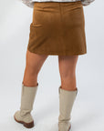 Back view of Z Supply Coconut Ciera Suede Mini Skirt featuring a smooth finish and clean lines, ideal for casual or dressy fall looks.
