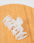Close-up of Wifey Bridal Claw Clip on wooden background