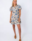 Floral mini dress with puff sleeves and blue and beige pattern, perfect for spring and summer occasions Mink Pink minkpink