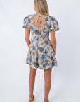 Floral mini dress with puff sleeves and back tie, beige and blue pattern, stylish women's apparel