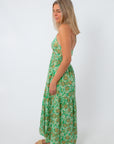 Green and pink floral maxi dress with spaghetti straps, side view