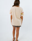 Butterfly Garden Oversized Graphic Tshirt, beige t shirt with floral garden design and side pockets