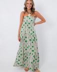 Show Me Your Mumu Coastal Collage Long Weekend Maxi Dress worn by smiling woman with jewelry