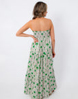 Rear view of woman in Show Me Your Mumu Coastal Collage Maxi Dress showing back design