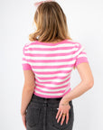 Back view of Sweetheart Stripe Cropped Cardigan Sweater in pink and white knit, highlighting short sleeves and ribbed hem for a fitted look.