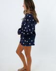 Matching lounge set navy polka dot shorts with zip-up hoodie, navy and white polka dot shorts set
