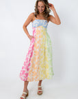 Colorful floral midi dress with spaghetti straps and pockets