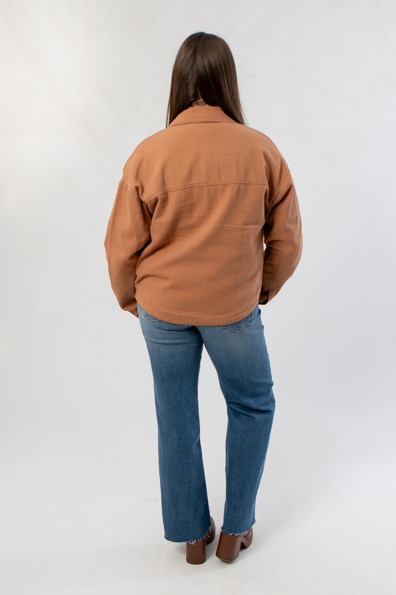 Back view of Vintage Camel Twill Utility Jacket highlighting its structured twill fabric and oversized silhouette for cozy outerwear styling.