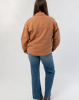 Back view of Vintage Camel Twill Utility Jacket highlighting its structured twill fabric and oversized silhouette for cozy outerwear styling.