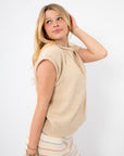 Piper Natural Short Sleeve Cardigan - side view of natural knit cardigan showing cap sleeves and soft texture for versatile styling.