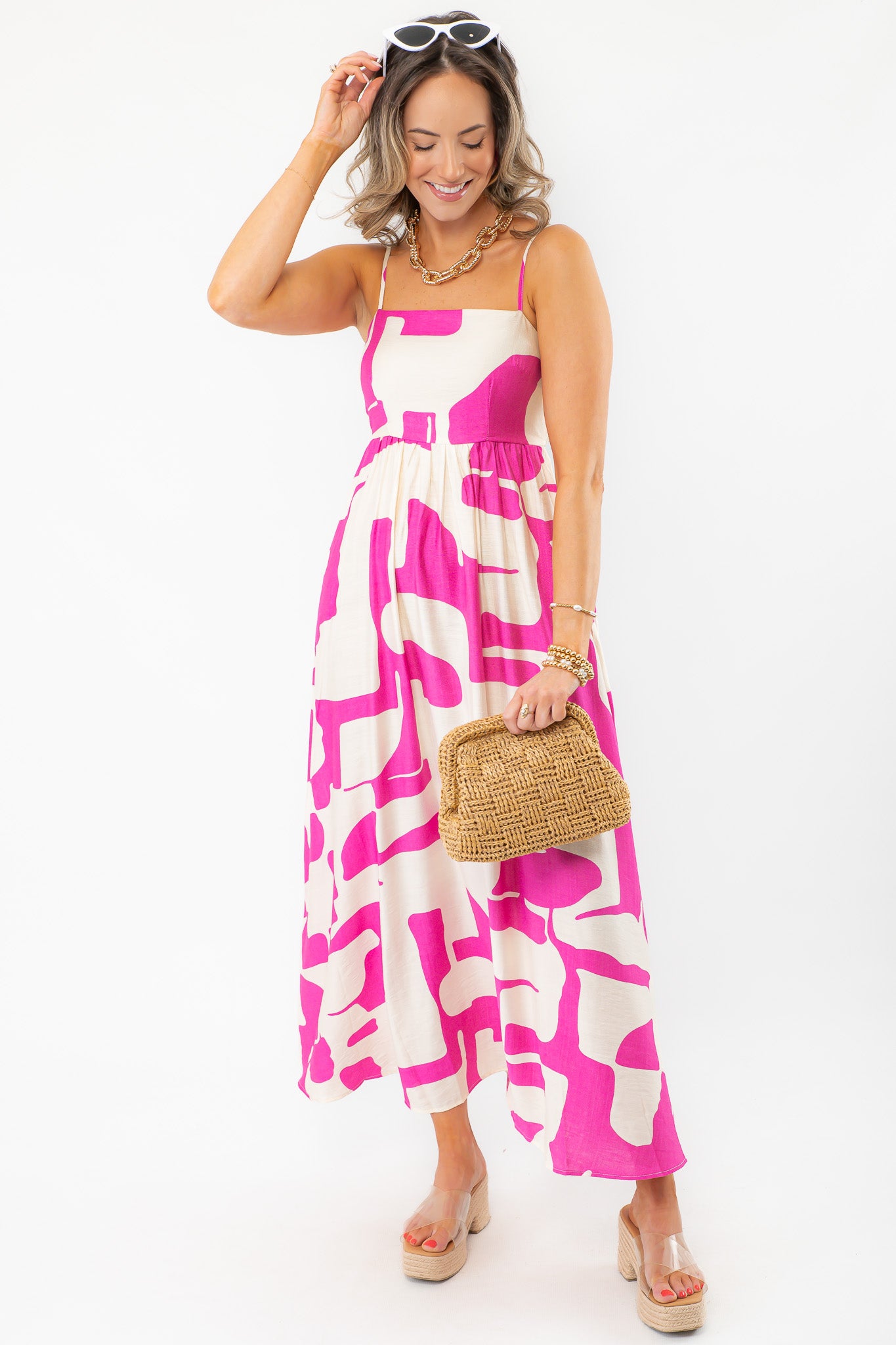 Meet Me in Santorini Fuchsia Wave Maxi Dress with square neckline and abstract pink print, styled for resort and beach fashion.