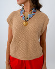 Tan textured sleeveless sweater for layering