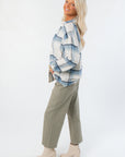 Z Supply Vintage Indigo River Plaid Button Up – Side view of soft plaid flannel shirt with drop shoulders and curved hem, ideal for lounge or casual wear.