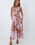 lilac and brown floral printed midi dress styled for summer getaway