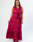 Cileah Jungle Dress in magenta with sleeveless maxi design, featuring a belted waist and tiered skirt, ideal for vibrant gameday looks.