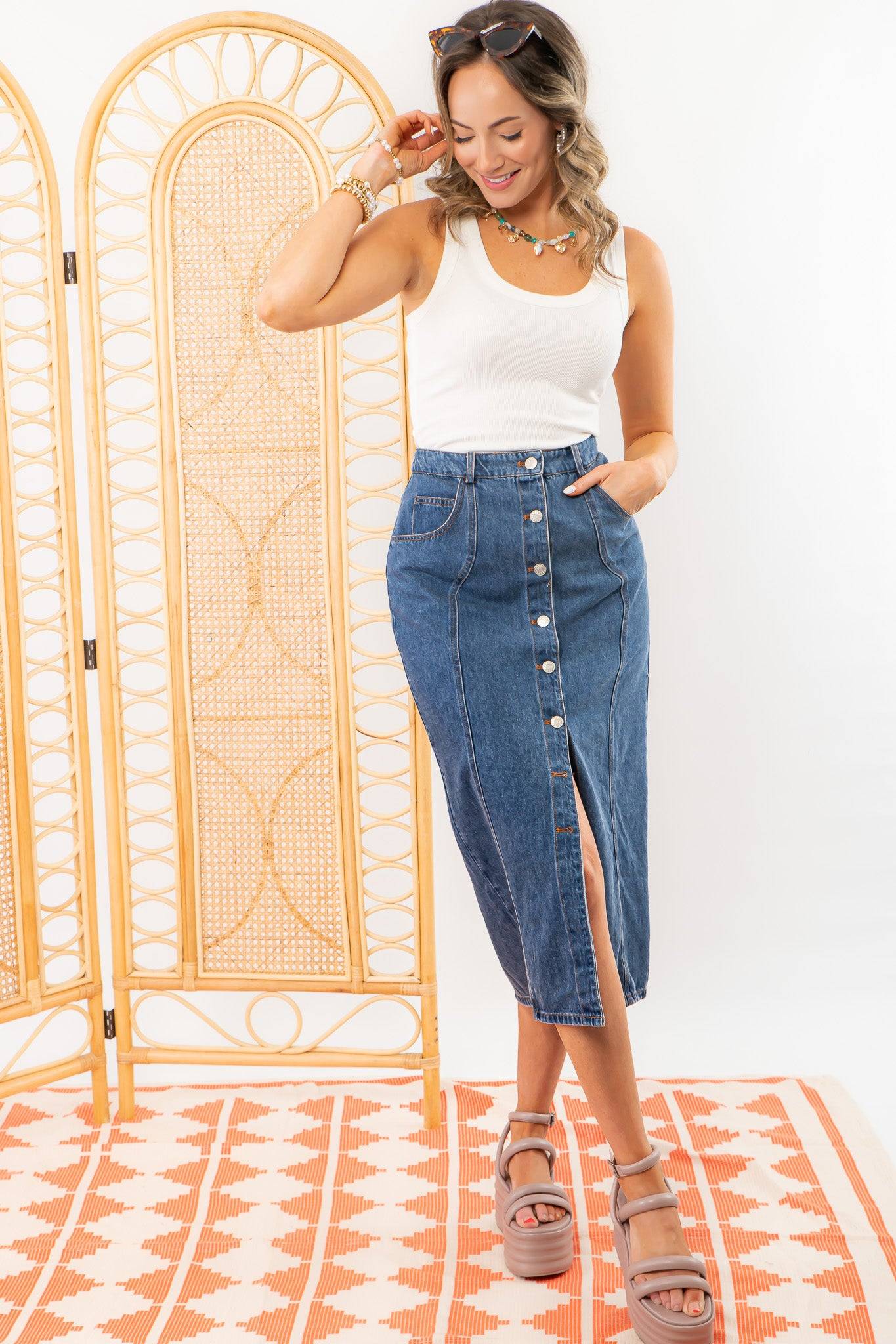 Bethany Dark Wash Button Down Denim Skirt with front slit and pockets, ideal for versatile styling and everyday wear.