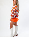 Side view of Queen of Sparkles Clemson Mascot Rhinestone Cardigan showing detailed rhinestone tiger paw design and cozy fit.