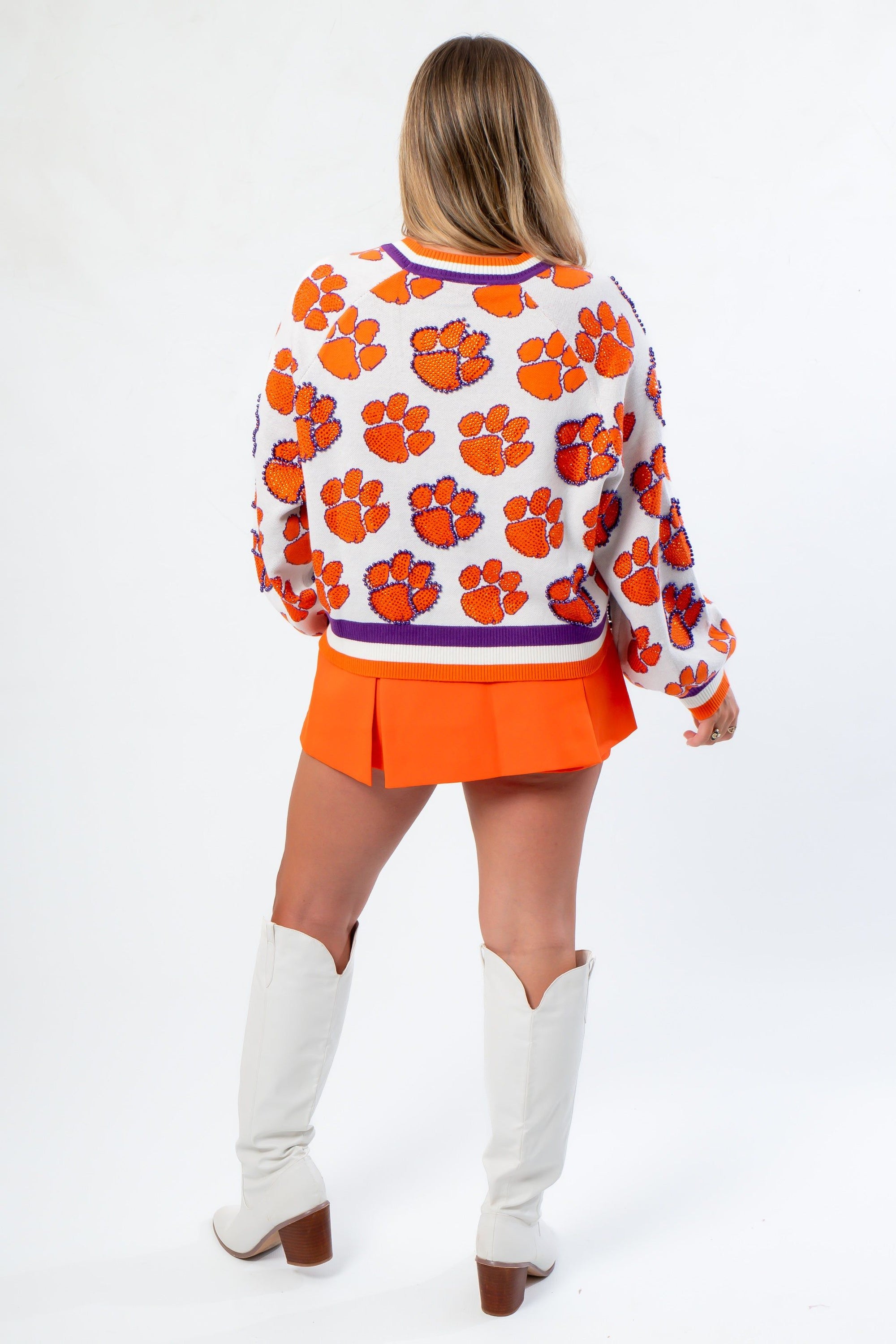 Back view of Queen of Sparkles Clemson Mascot Rhinestone Cardigan showcasing full coverage of orange rhinestone tiger paw prints.