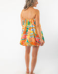 Rear view of Show Me Your Mumu Bubble Dress highlighting strapless cut and colorful A-line shape, ideal for warm-weather occasions.