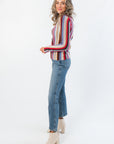 Side view of Steve Madden Burgundy Serra Stripe Sweater showing fitted silhouette and colorful knit pattern, ideal for layering in cool weather.