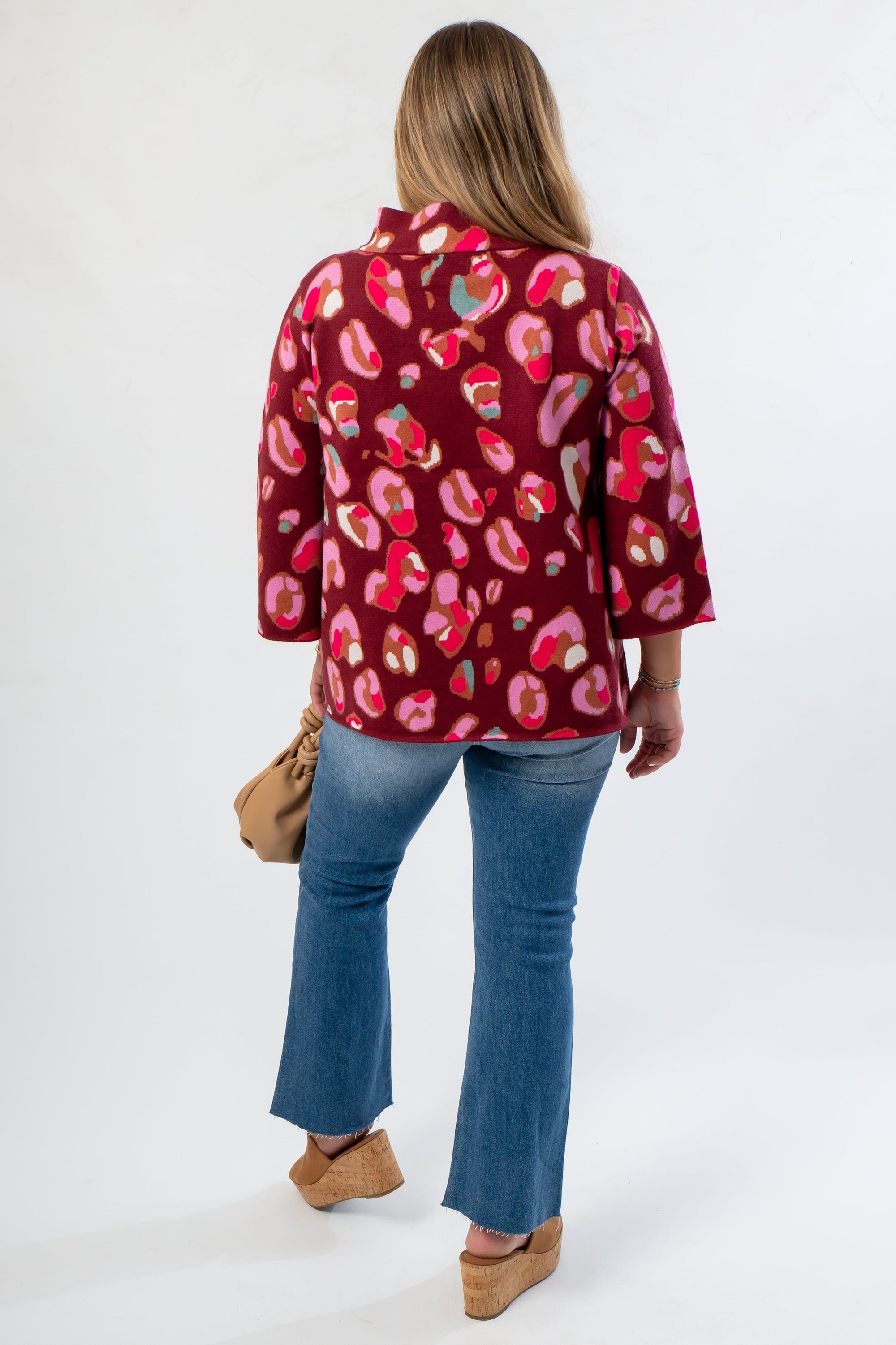 Back view of FA Multicolor Animal Print Mock Neck Sweater LM highlighting the bold print and comfortable fit, perfect for seasonal layering.