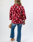 Back view of FA Multicolor Animal Print Mock Neck Sweater LM highlighting the bold print and comfortable fit, perfect for seasonal layering.