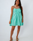 Mint green ruched front mini dress with pockets