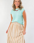 Tiffany Sleeveless Blue Ribbed Knit Top styled with a beige striped maxi skirt. Lightweight knit perfect for warm fall days.