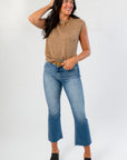 Cozy fall essential Tiffany Sleeveless Brown Ribbed Knit Top paired with cropped jeans and leopard belt for a casual autumn outfit.