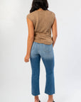 Back view of Tiffany Sleeveless Brown Ribbed Knit Top highlighting ribbed hem and soft knit fabric, perfect for warm autumn days.