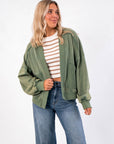 Weekend Moves Frosted Sage Terry Lounge Cardigan styled open over a striped crop top and wide-leg jeans, perfect cozy fall outerwear.