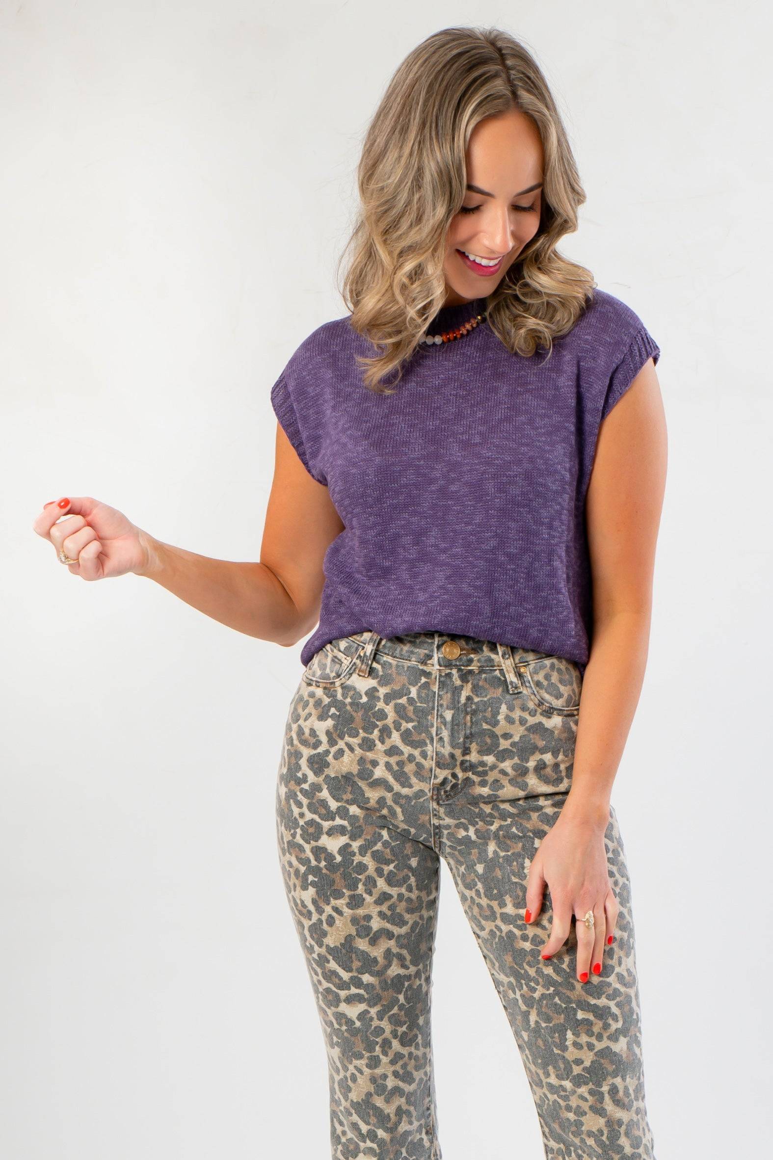 Tiffany Sleeveless Purple Ribbed Knit Top styled with leopard print jeans, perfect lightweight sweater for fall layering.